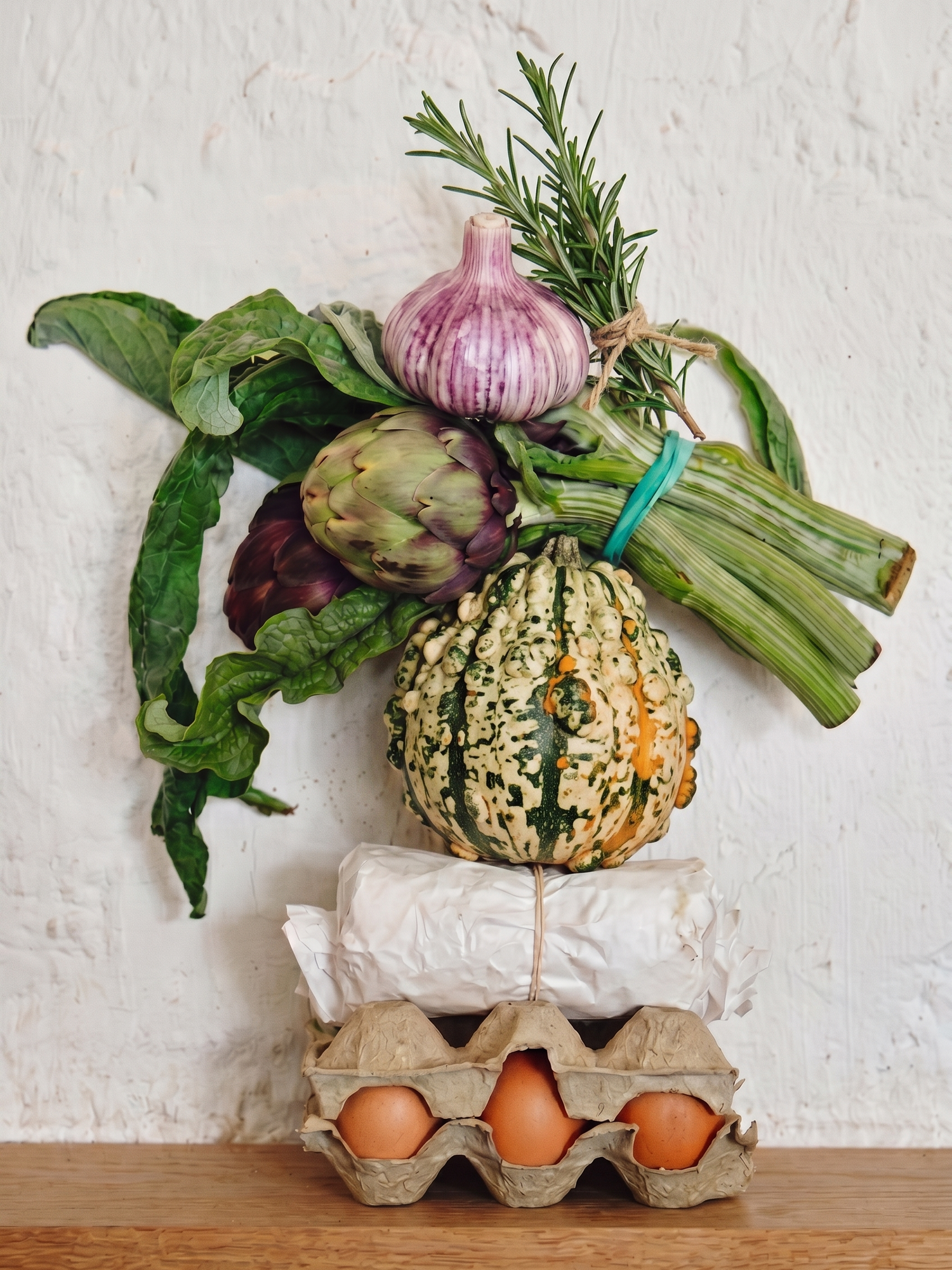 Stack of vegetables and eggs photographed for Nectar