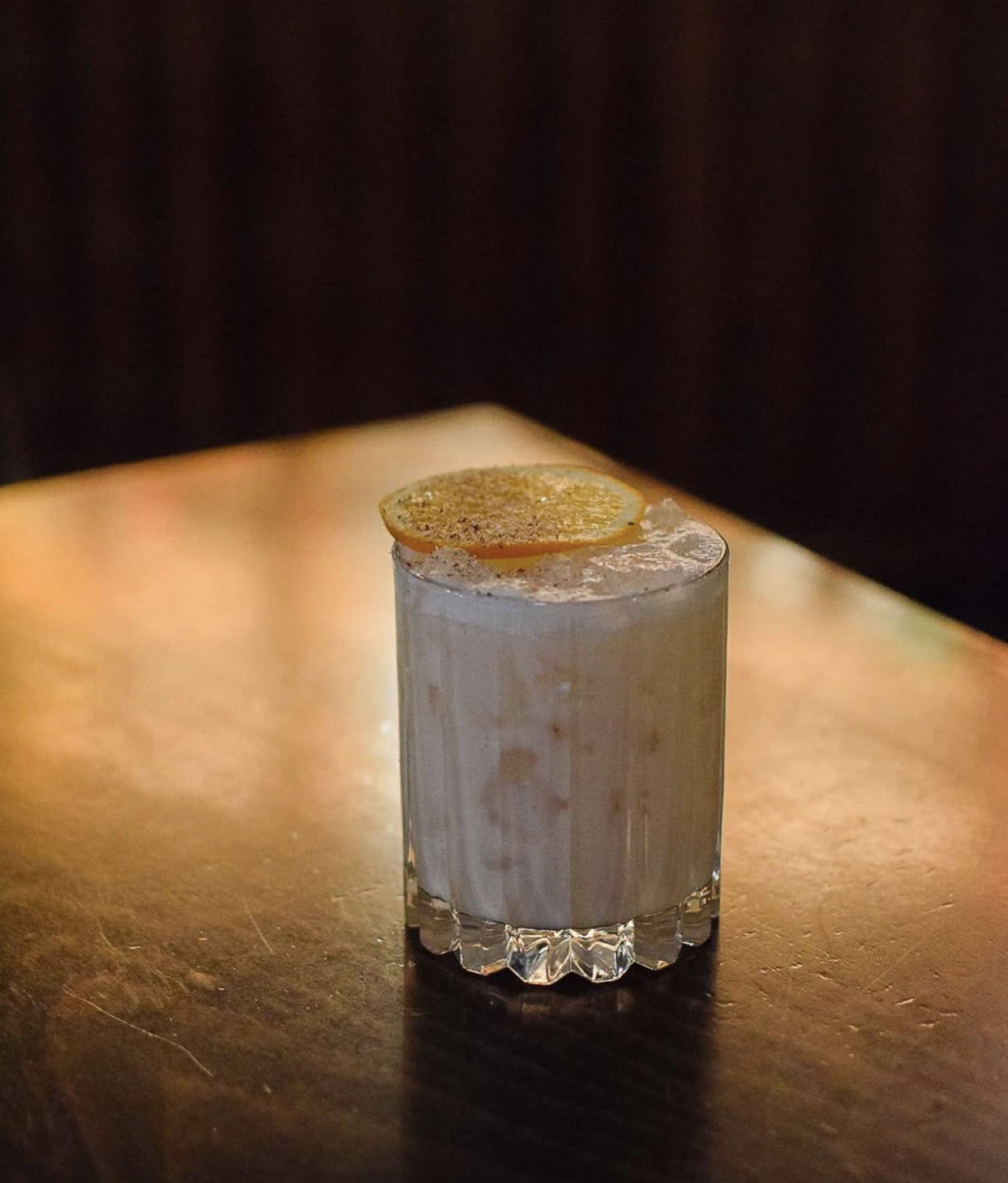 A cocktail photographed at night for Nectar